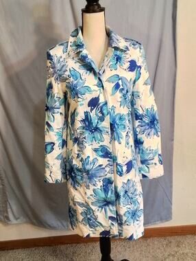 Bernardo white fall weather coat with blue flowers.